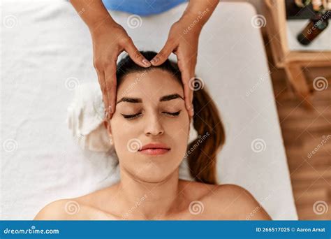 Two Women Therapist And Patient Having Facial Massage Session At Beauty Center Stock Image