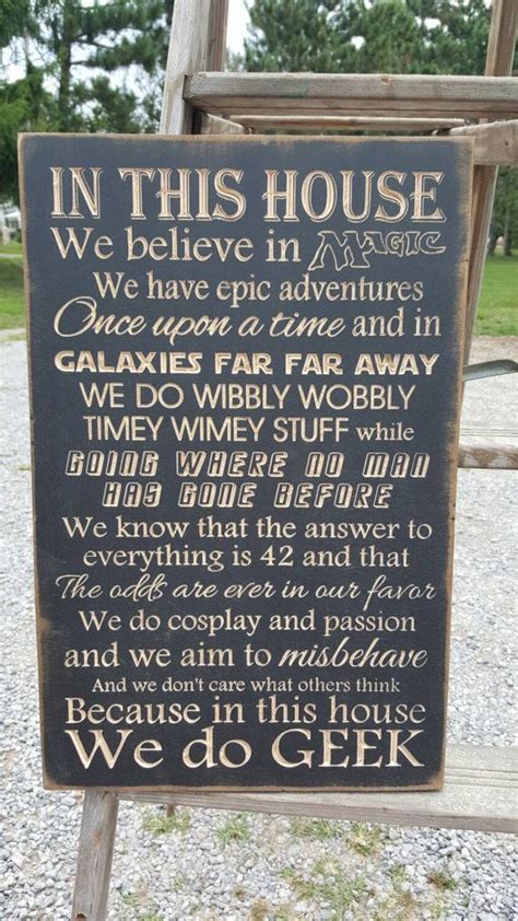Custom Carved Wooden Sign In This House We Believe In