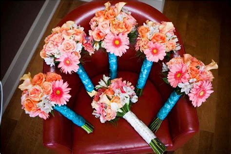 Deeper coral red or coral pink pair beautifully with teal green, teal blue, or turquoise because red's complementary color is green. Coral and Teal Wedding Theme | Teal wedding theme, Beach ...