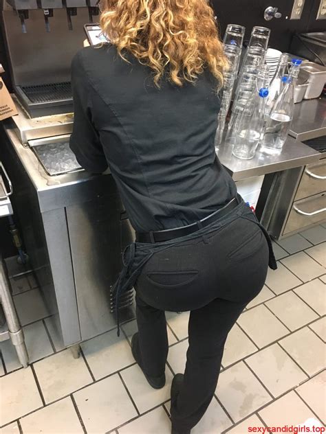 Girl In Tight Pants Bend Over In The Restaurant Kitchen