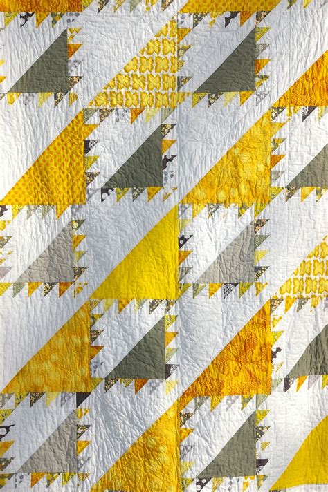 Yellow and gray bedding is a modern color combination that can freshen up any bedroom in the house. Quilt Story: Yellow and Grey Lady of the Lake Quilt...