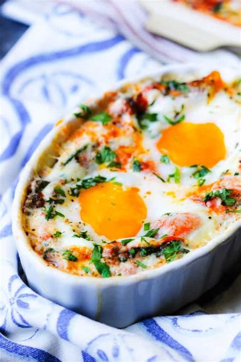 Set the dish in hot water and place in a moderate oven. Baked Eggs in Tomato Spinach Cream Sauce - Eating European