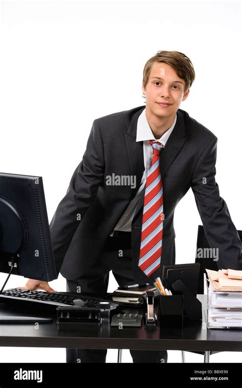 A Young Boy As A Businessman At The Office Stock Photo Alamy