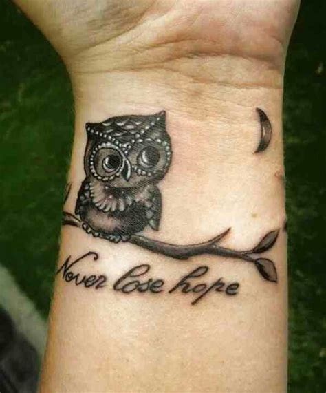 An Owl Tattoo On The Wrist Saying Youve Got Hope