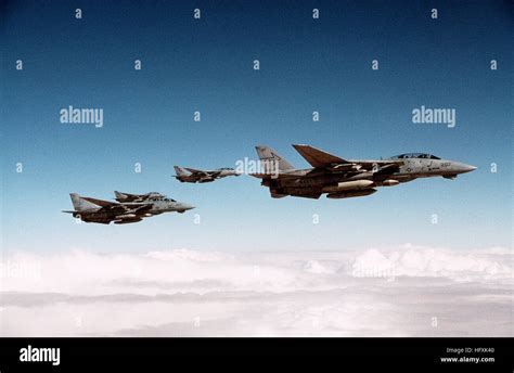 F 14a Tomcat Aircraft Fly In Formation As They Prepare For Refueling