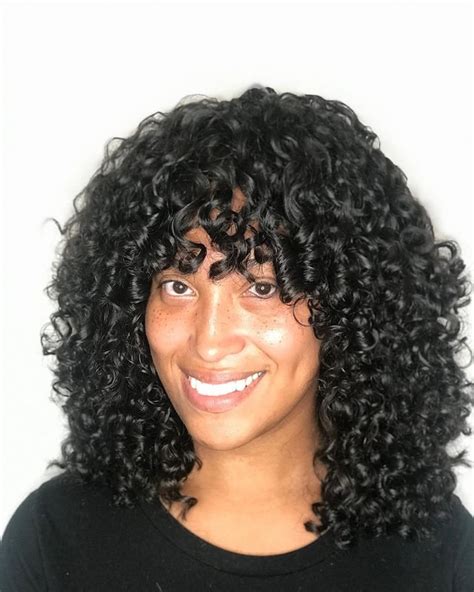 25 Best Ways To Style Curly Hair With Bangs Styledope