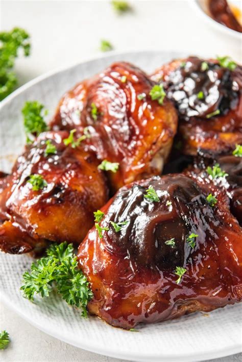 Arrange skin side up in a shallow baking pan, making sure that pieces don't touch. BBQ Baked Chicken Thighs | Recipe in 2020 | Baked barbeque ...