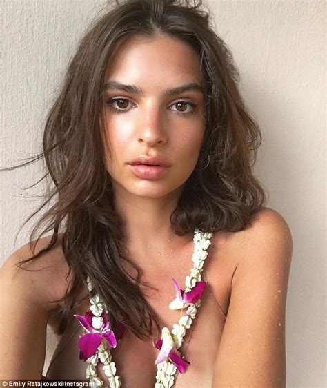 Emily Ratajkowski Draws Attention To Her Ample Assets In Sexy Pink