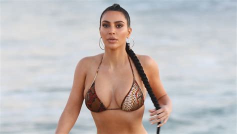 Kim Kardashian Flaunts Her Curves In A Bikini See The Beach Photos Bikini Kim Kardashian