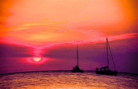 Peach And Purple Sunset On Caye Caulker By Lee Vanderwalker Purple