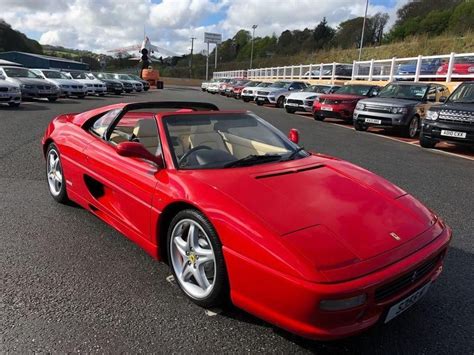 Tour de france blue, tan embossed leather, carbon fibre sill covers, 5 star alloys, scuderia wing shields, tubi exhaust, ferrari embossed brake calipers, 4 spoke nero leather steering wheel, electric windows and. eBay: 1999 T FERRARI F355 GTS TARGA F1 COUPE AUTO ONLY 27,000 MILES | Carros