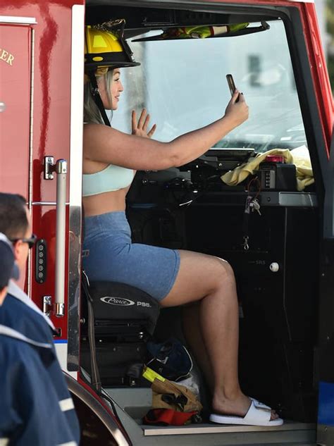 Iskra Lawrence Flaunts Her Curves As She Poses With Firefighters For