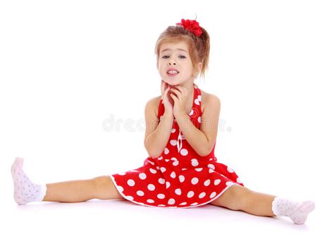 collection of tiny spread leg art dancer girl posing with open legs hiding face stocksy united