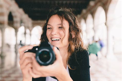 Pretty Young Female Photographer Taking Pictures In Italy By Stocksy