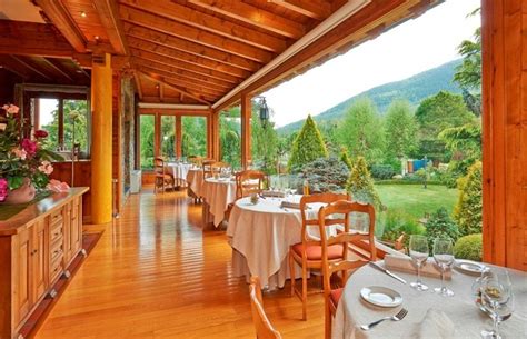 A su privilegiada ubicación se une la belleza de su arquitectura, propia de los chalets de montaña, que facilita su perfecta integración en el entorno natural. Hotel Grevol Spa, Llanars (Girona) - Atrapalo.com