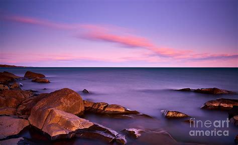 Sunset And Rocks In Lake Superior Photograph By Thomas Jones