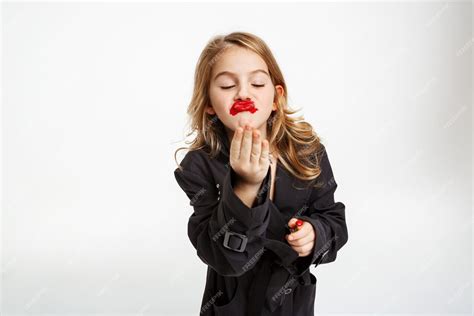 Free Photo Funny Girl With Messy Make Up Wearing Fashion Black Trench Air Kissing Hoding Red
