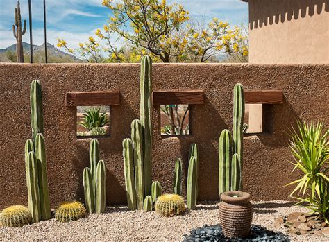 For a classic southwest look, use traditional building materials like gravel. desert wall | Desert landscape design, Desert landscaping