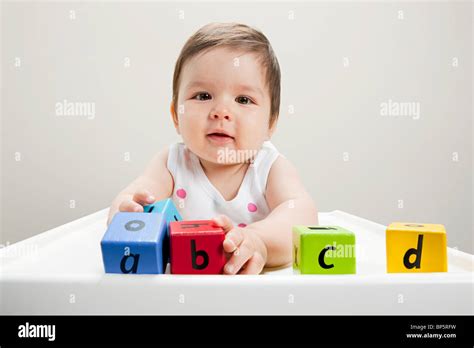 Baby Playing Wood Blocks Stock Photos And Baby Playing Wood Blocks Stock