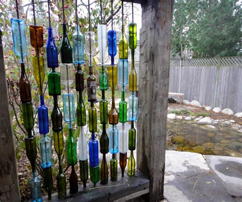 How To Build A Wall From Recycled Bottles Wine Bottle Wall Patio Wall Art Bottle Wall