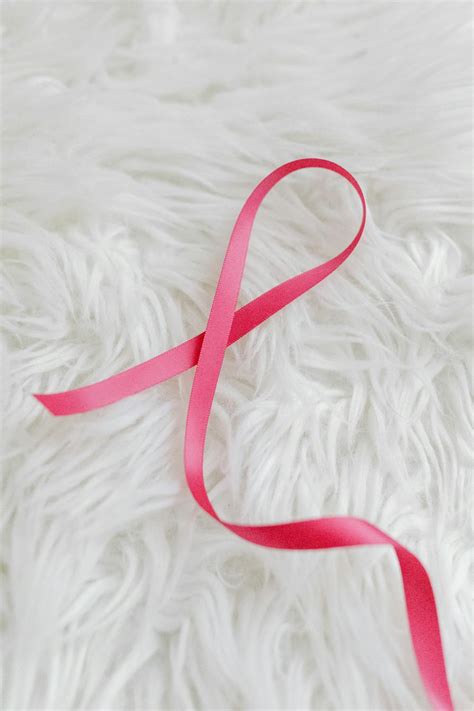 Pink Strap On White Textile · Free Stock Photo