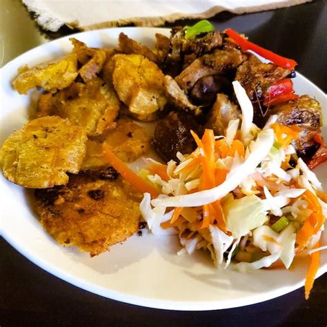 Haitian Griot Fried Pork With Pikliz And Banan Peze Fried Plantains