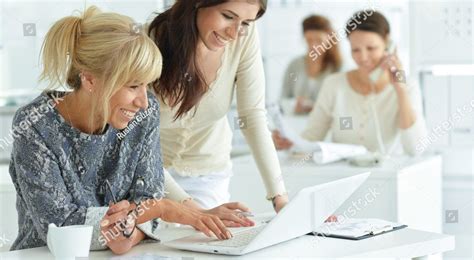 Stock Photo Women Working Together In Office 551095627 Iasme