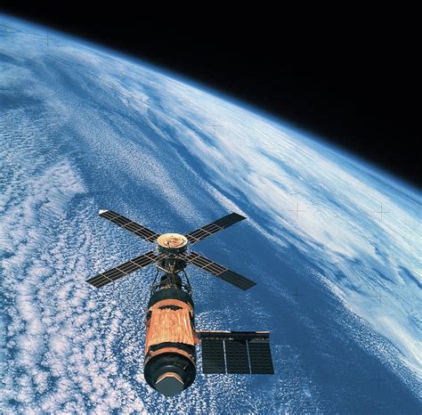 Elevated View Of A Satellite Orbiting Photograph By Stockbyte