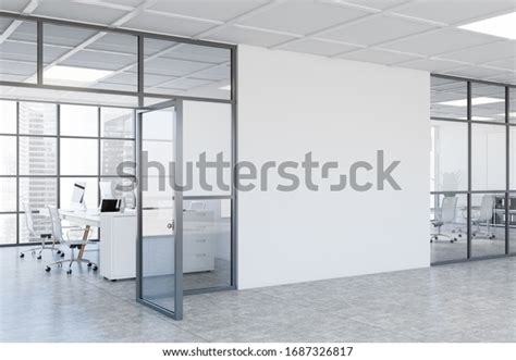 Interior Of Modern Business Center Hall With White And Glass Walls