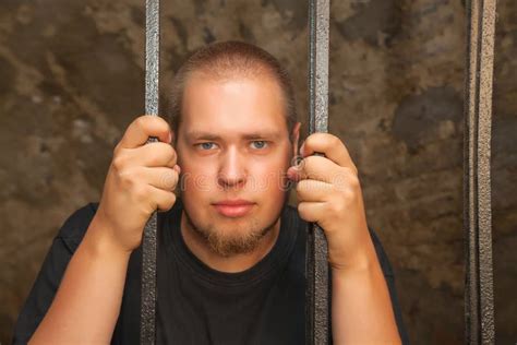 Young Man Behind The Bars Stock Photo Image Of Prison 26579484