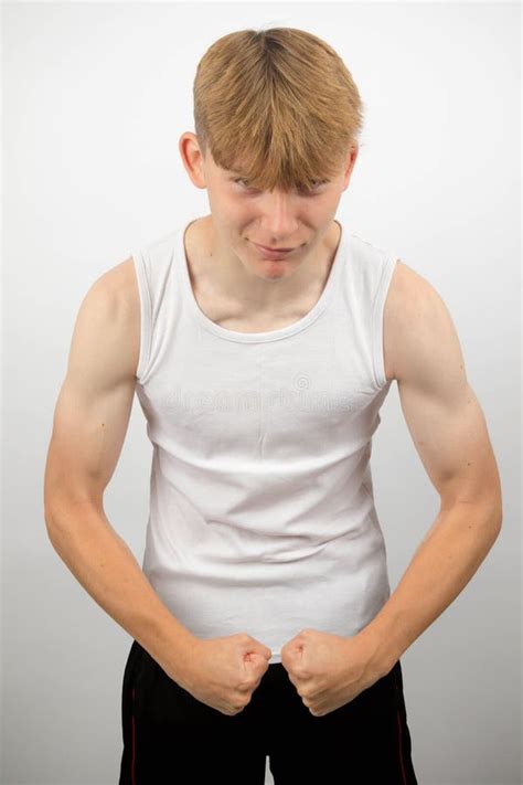Boy Flexing His Muscles Stock Image Image Of Young Smiling 5123993