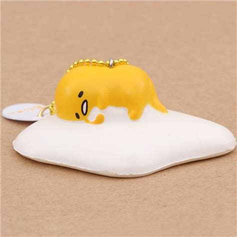 Cute Gudetama Egg Yolk Sleeping Holding Egg White Squishy Charm Kawaii