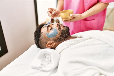 Man Reciving Facial Treatment At Beauty Center Stock Image Image Of