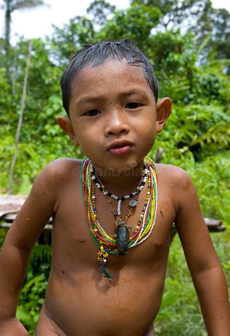 Portrait Of A Boy Mentawai Tribe With Beads Around His Neck Editorial