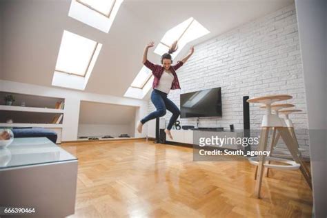 Woman Jumping Out Window Photos And Premium High Res Pictures Getty