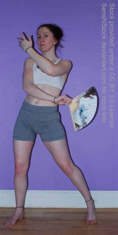 Female Pose Reference Woman Holding A Fan