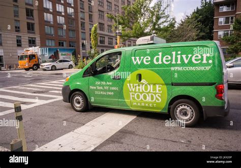 A Whole Foods Market Delivery Van In The Chelsea Neighborhood Of New