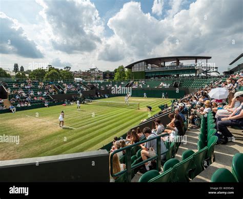 Mixed Doubles Match At The Wimbledon Tennis Tournament London England