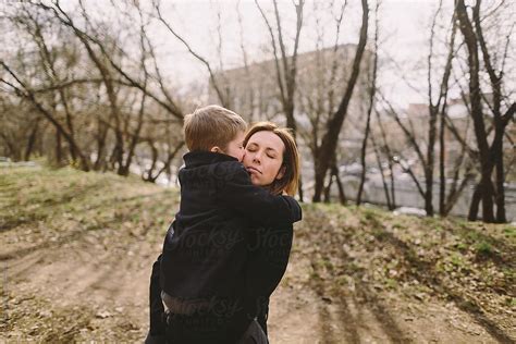 Little Son Kissing His Mom By Stocksy Contributor Evgenij Yulkin