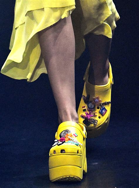 Combining the classic resin shoe with a sturdy elevated heel in a. Balenciaga's Platform Crocs at Paris Fashion Week: Love It ...