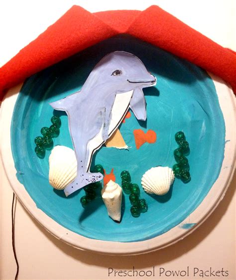 A Pod Of Dolphin Puppets And Paper Plate Oceans ~ A Preschool Craft