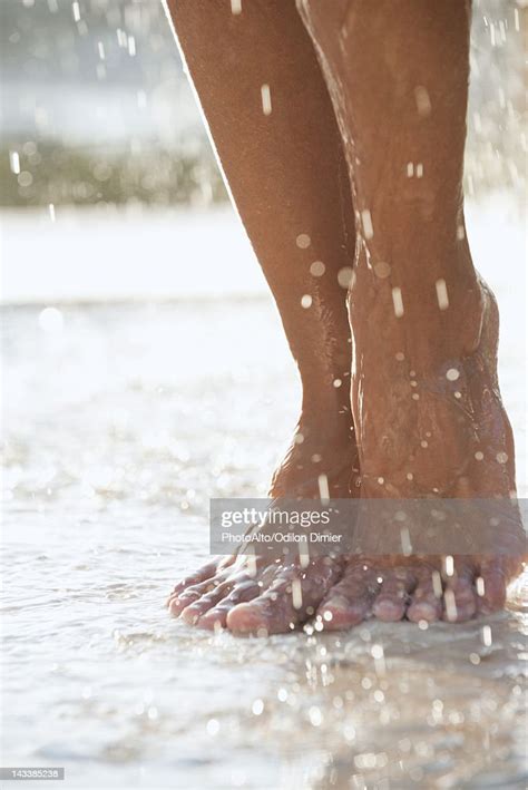 Feet Under Shower Outdoors Photo Getty Images
