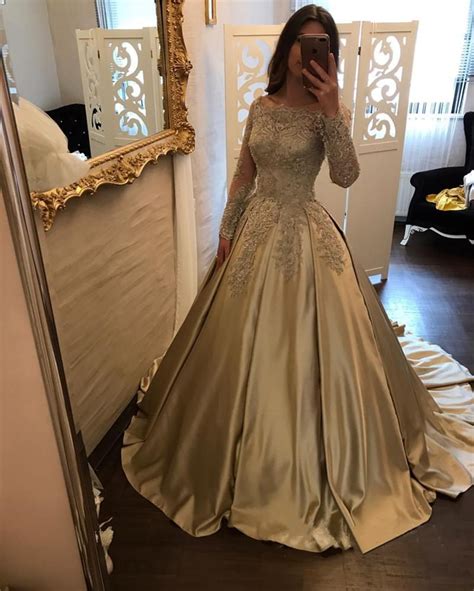 We curate our gown selection from all over the. Vintage Gold Lace Long Sleeves Satin Ball Gowns Wedding ...