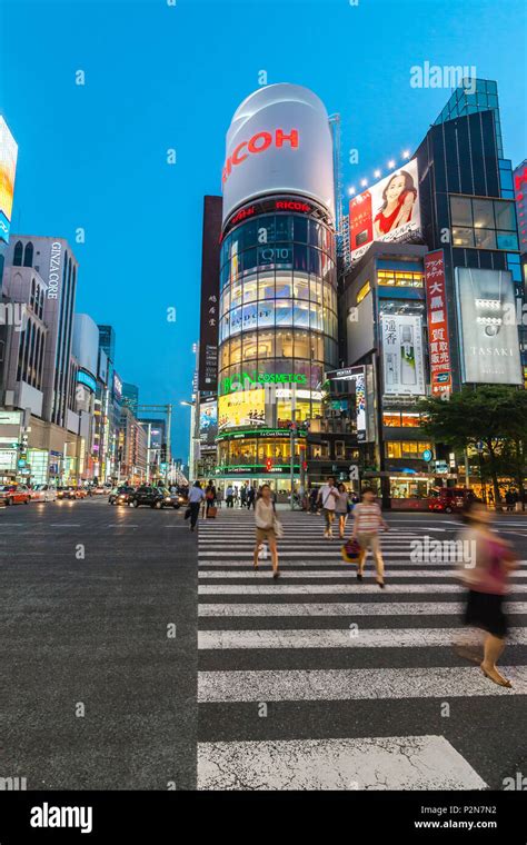 Zebra Crossing With Moving Women At Ricoh Imaging Square In Ginza