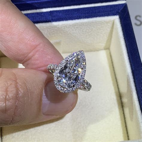Outrageous Pear Shaped Halo Diamond Engagement Ring Princess Cut