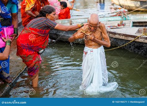 Hindu Religious Rituals In The River Ganges In Varanasi Editorial Photo