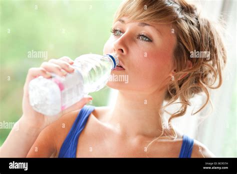 Girl Drinking Glass Of Water Stock Photo Alamy
