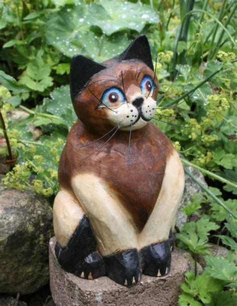 Logo vorlage mit bleistift stehenden punkt unten am. Dschungel-Shop - Katze aus Holz