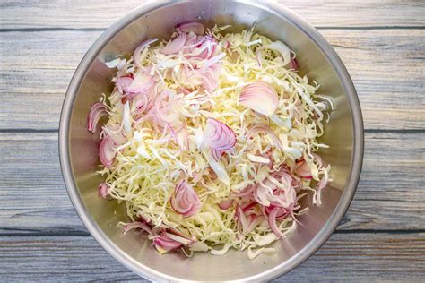 Let stand five minutes, then transfer to a large colander and rinse thoroughly under cold running water. Tangy Coleslaw With Vinegar Dressing Recipe