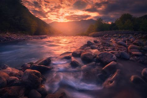 Download 1920x1080 River Stream Stones Sunset Clouds Wallpapers For